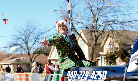 christmas suit tossing candy